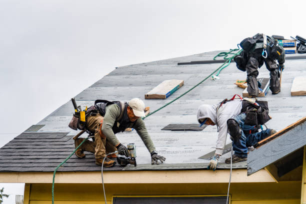 Professional Gutter Installation technician working in Elizabeth, CO